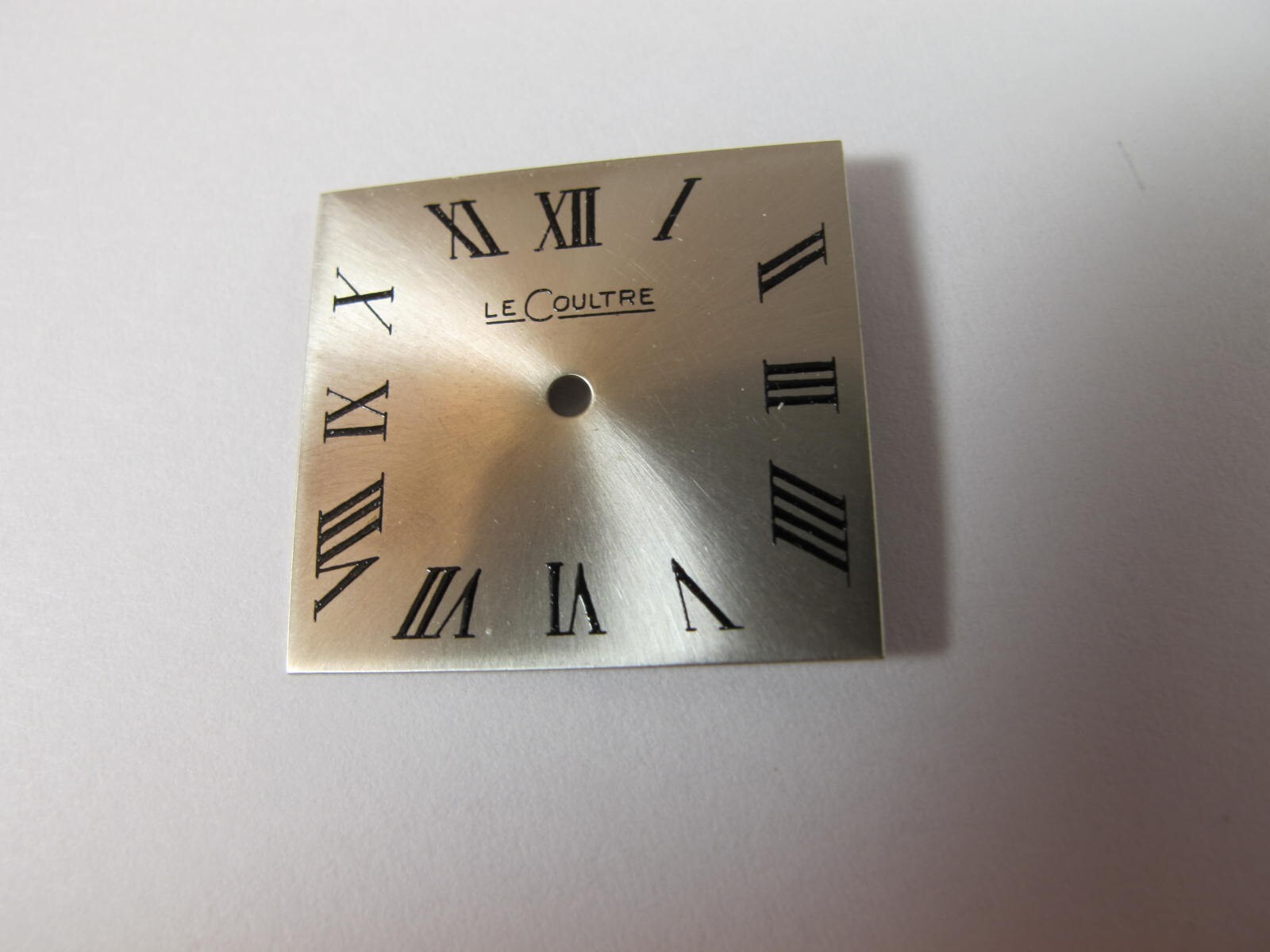 LECOULTRE SILVER COLOR SQUARE DIAL WITH BLACK ROMAN NUMERALS OLD STOCK