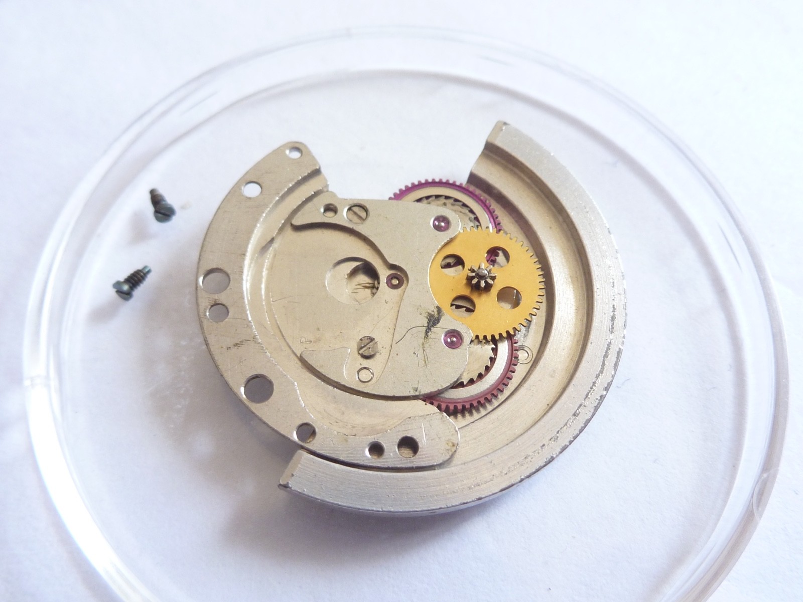 GENUINE Authentic Rolex Rotor + bridge 1570 perfect condition completely screw