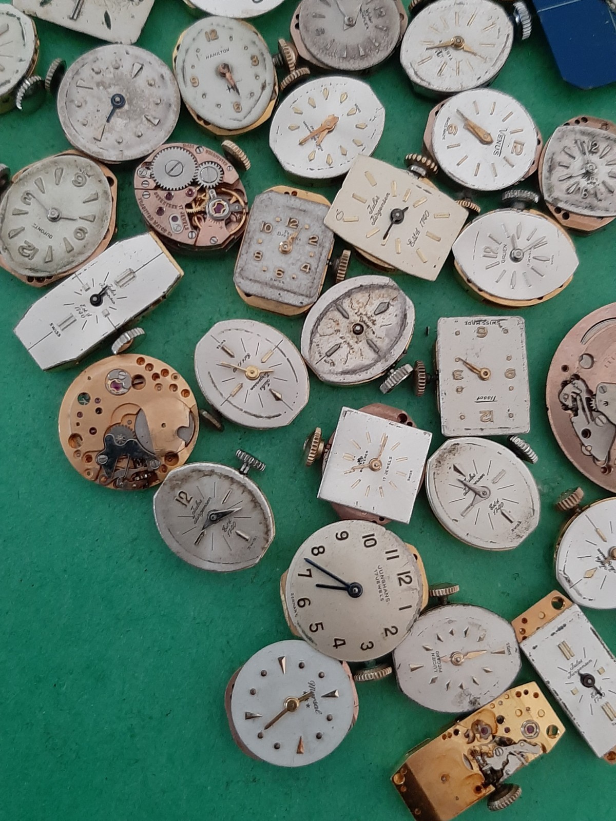 Lot of 60 Mechanical Wrist Watch Movements Parts Repair Manual Gold Cooper Tone
