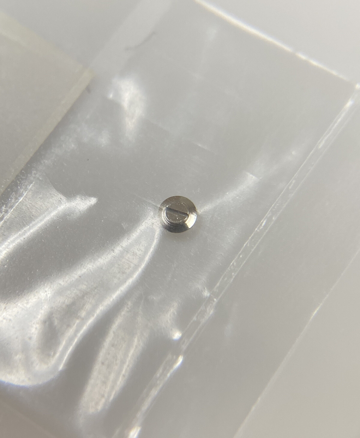 Genuine Rolex 1530 1520 Part #7896 Screw for Case Head Bevelled New Open Package