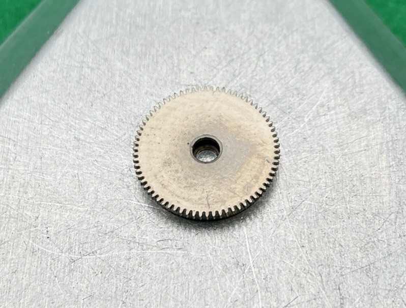 Bulova 11AF PART #1 Barrel and Cover watch parts. Preowned. (11A9)