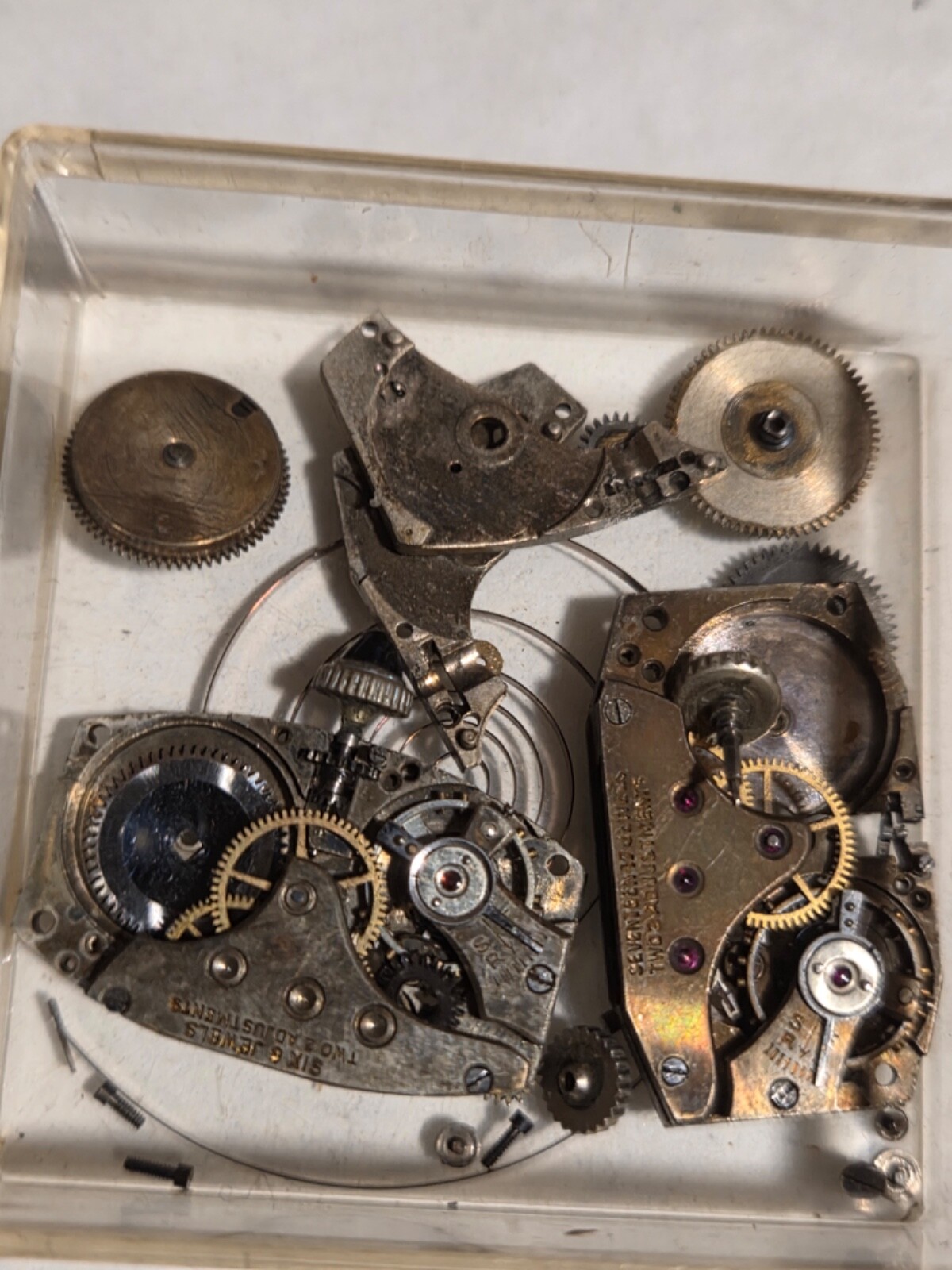 Two (2) A.Michel 640 movements. Partially disassembled, with parts.