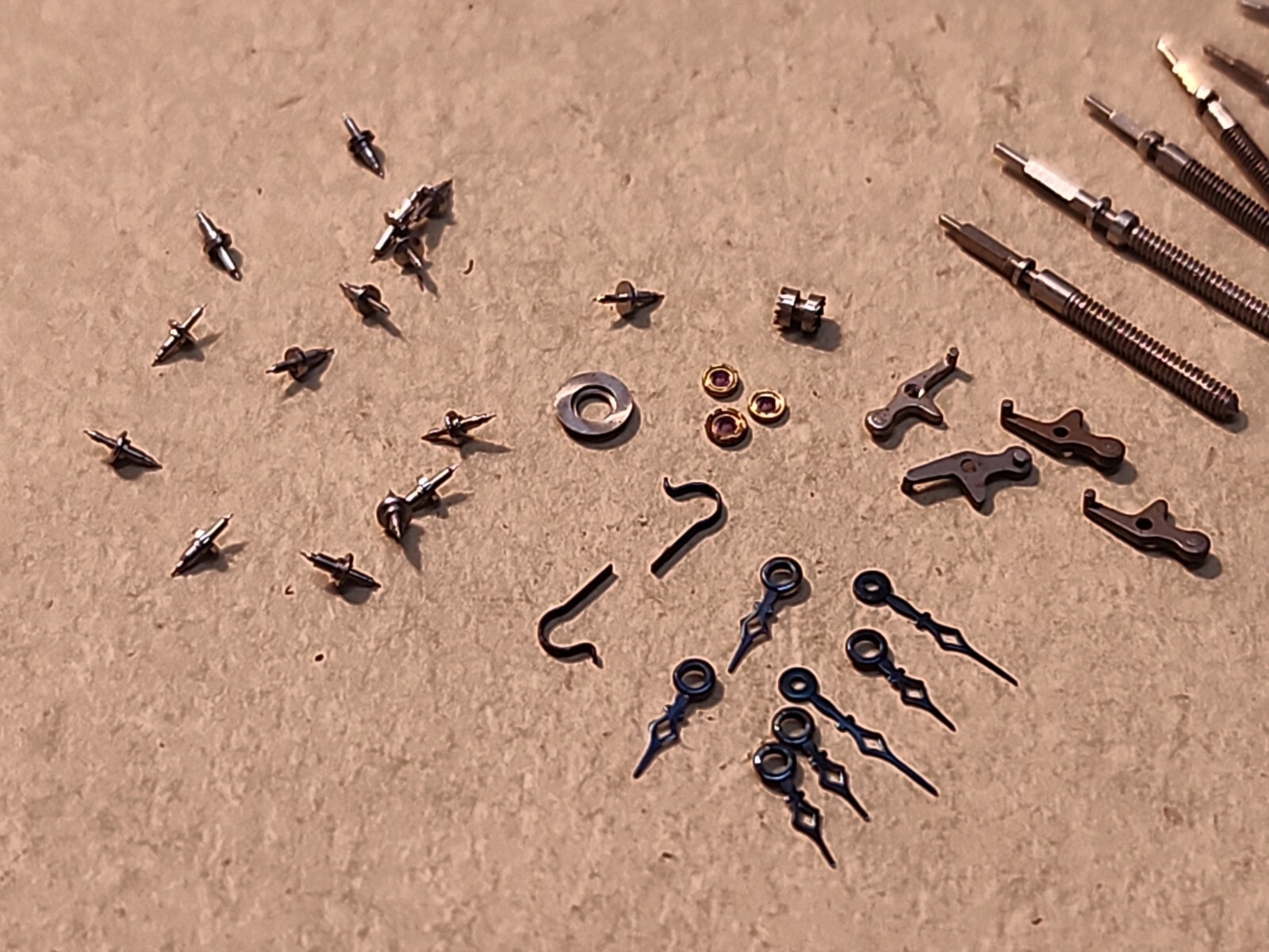 Lot Of NOS Elgin 21/0 Mixed Parts-Stems, Balance Staffs, Jewels, Hands, Etc