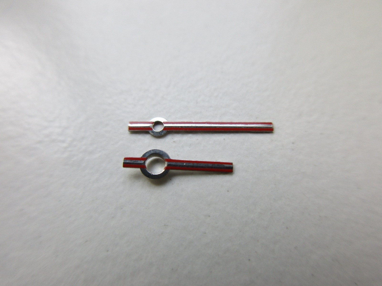 Set of 2 steel-red watch hands AS cal. 2063 – size 150/90