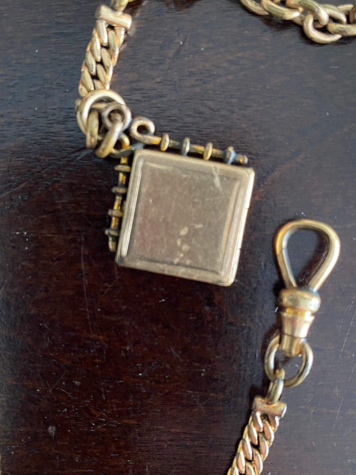 VINTAGE SIMMONS 11 INCH POCKET WATCH CHAIN, YELLOW GOLD FILLED WITH LOCKET FOB