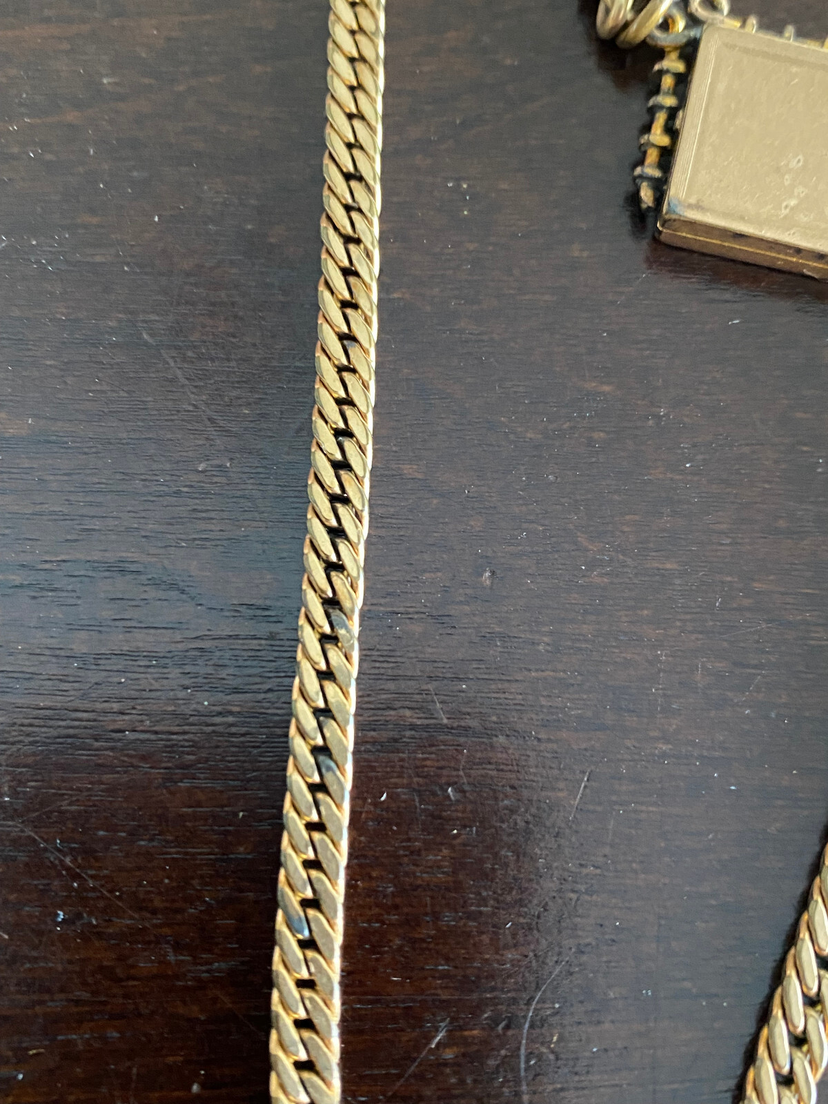 VINTAGE SIMMONS 11 INCH POCKET WATCH CHAIN, YELLOW GOLD FILLED WITH LOCKET FOB