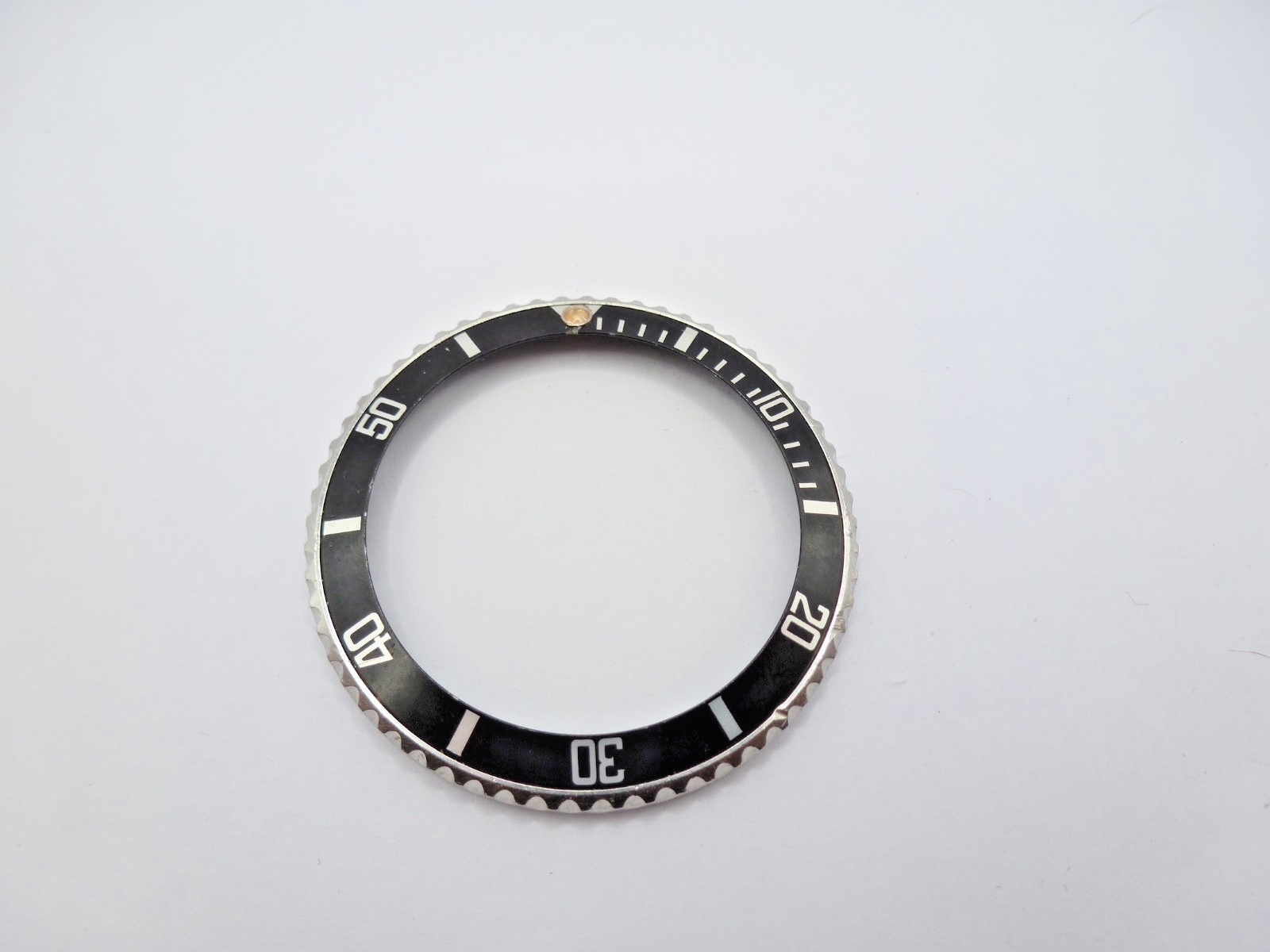 Genuine Rolex Submariner 16610/16800 complete bezel with insert vintage used .
