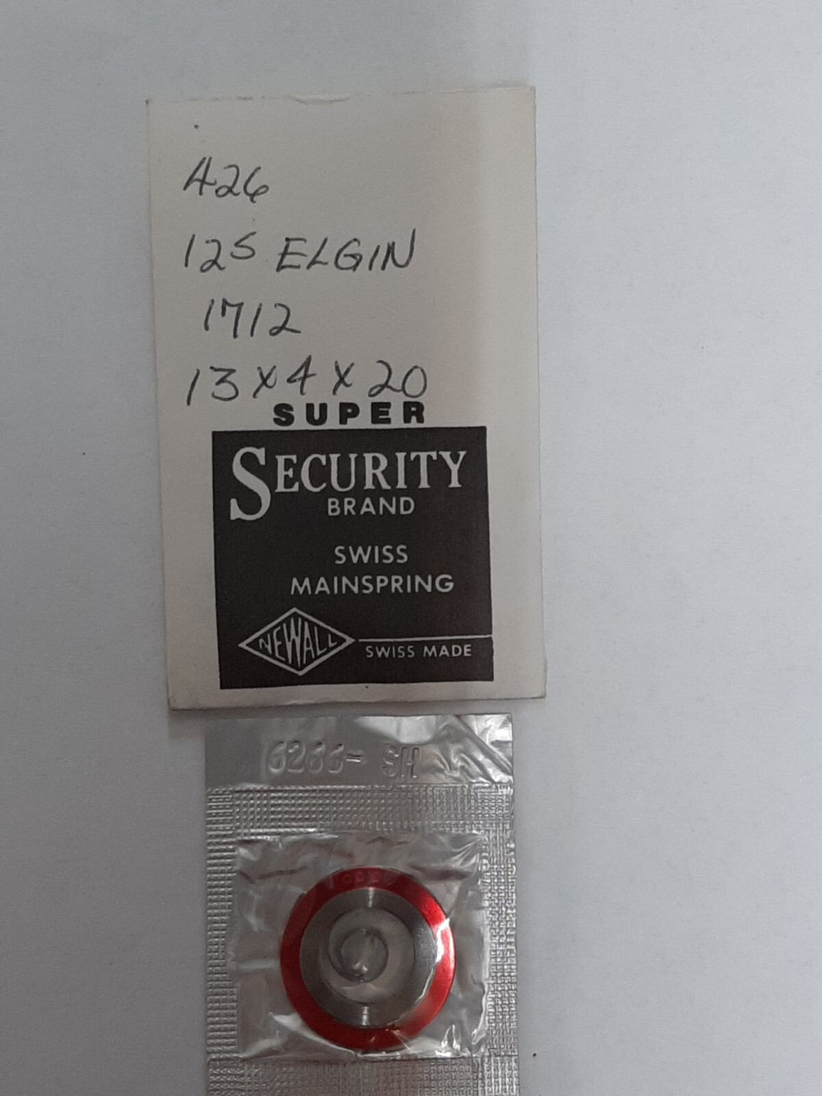 Elgin 12s white alloy mainspring