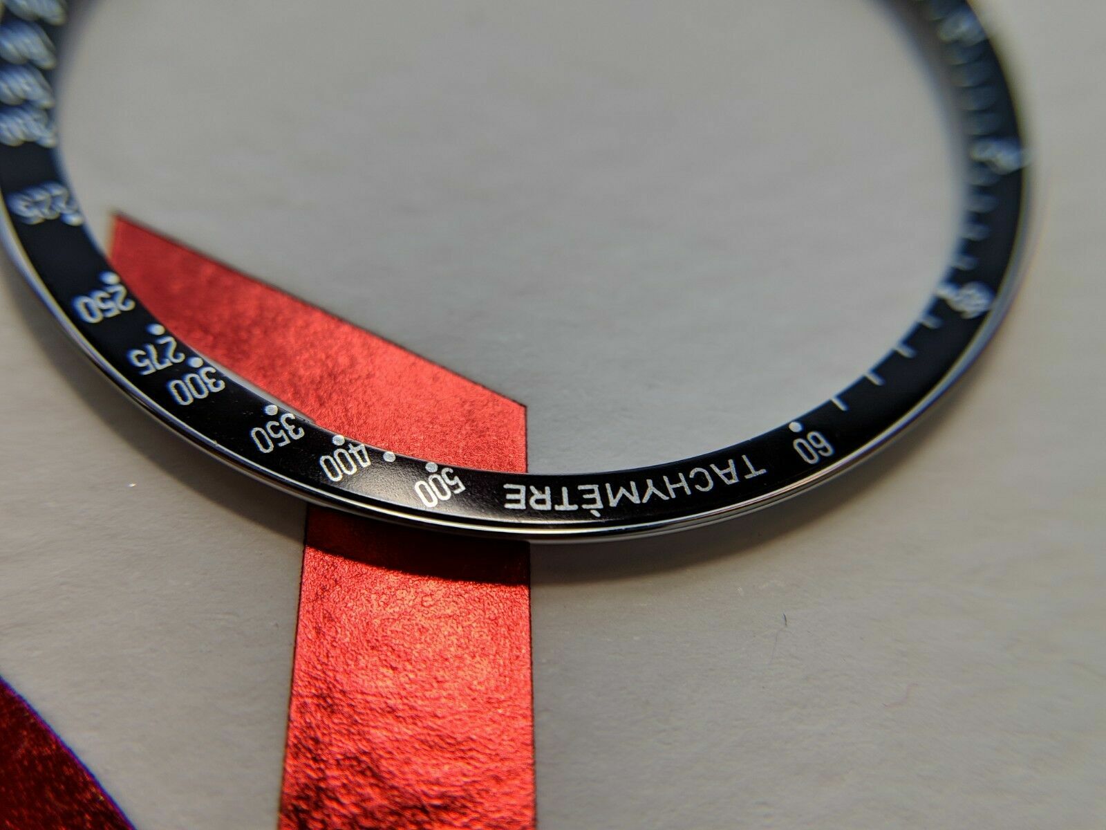 Aftermarket DON “Dot Over Ninety” Tachymeter Bezel for Omega Speedmaster