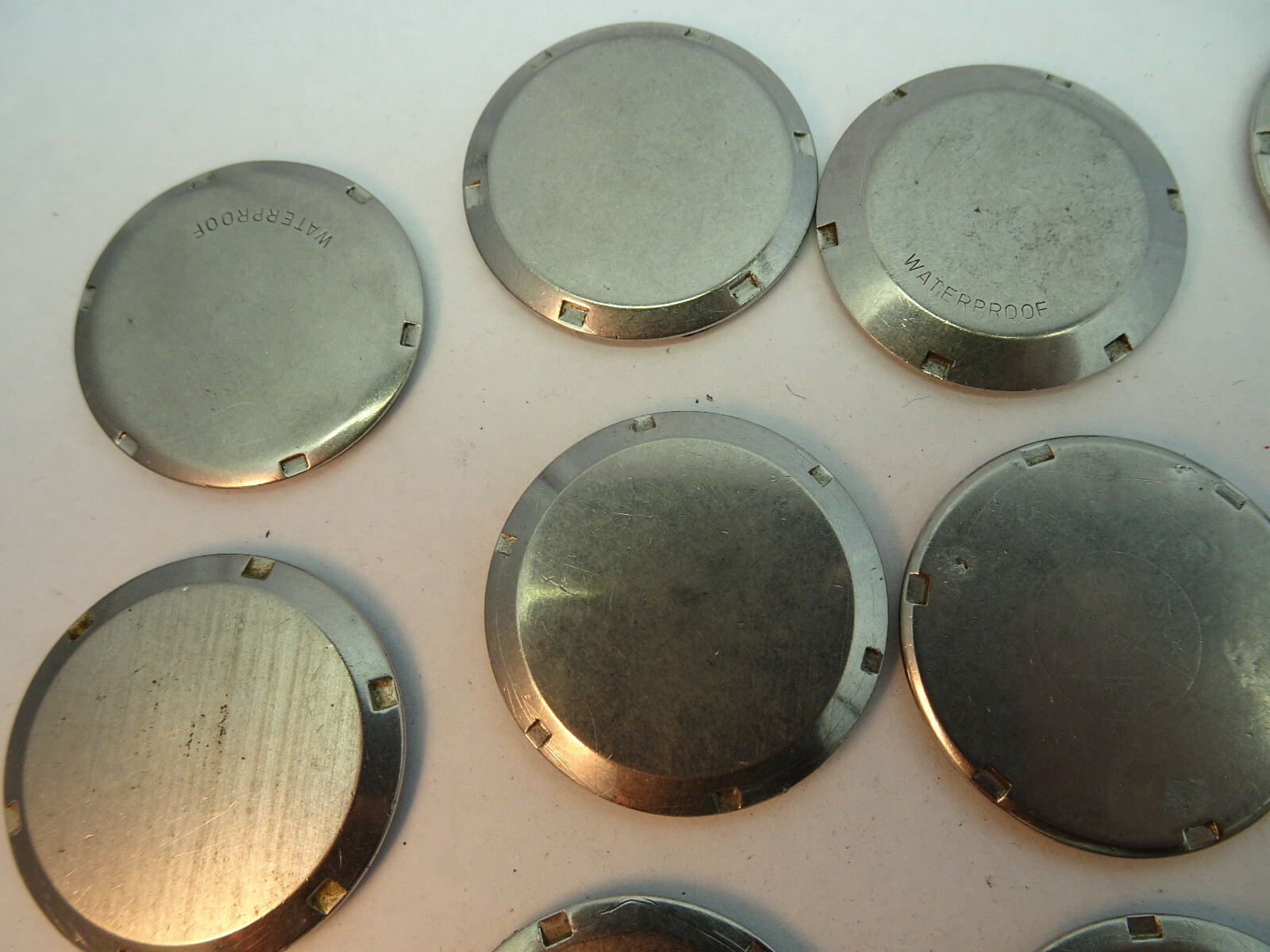 Omega vintage lot of stainless steel screwback watch covers for restorations