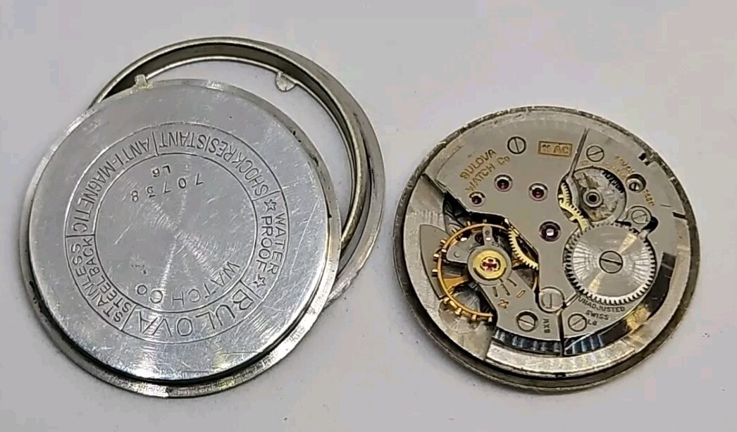 Vintage Bulova 11AC 17 jewel wrist watch movement with silver tone dial
