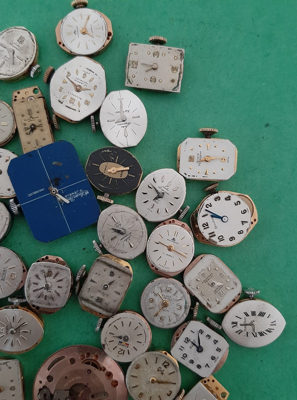 Lot of 60 Mechanical Wrist Watch Movements Parts Repair Manual Gold Cooper Tone