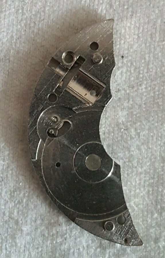 Bulova Caliber 10BC Part EB Number 105 (Barrel Bridge + Click and Screw)