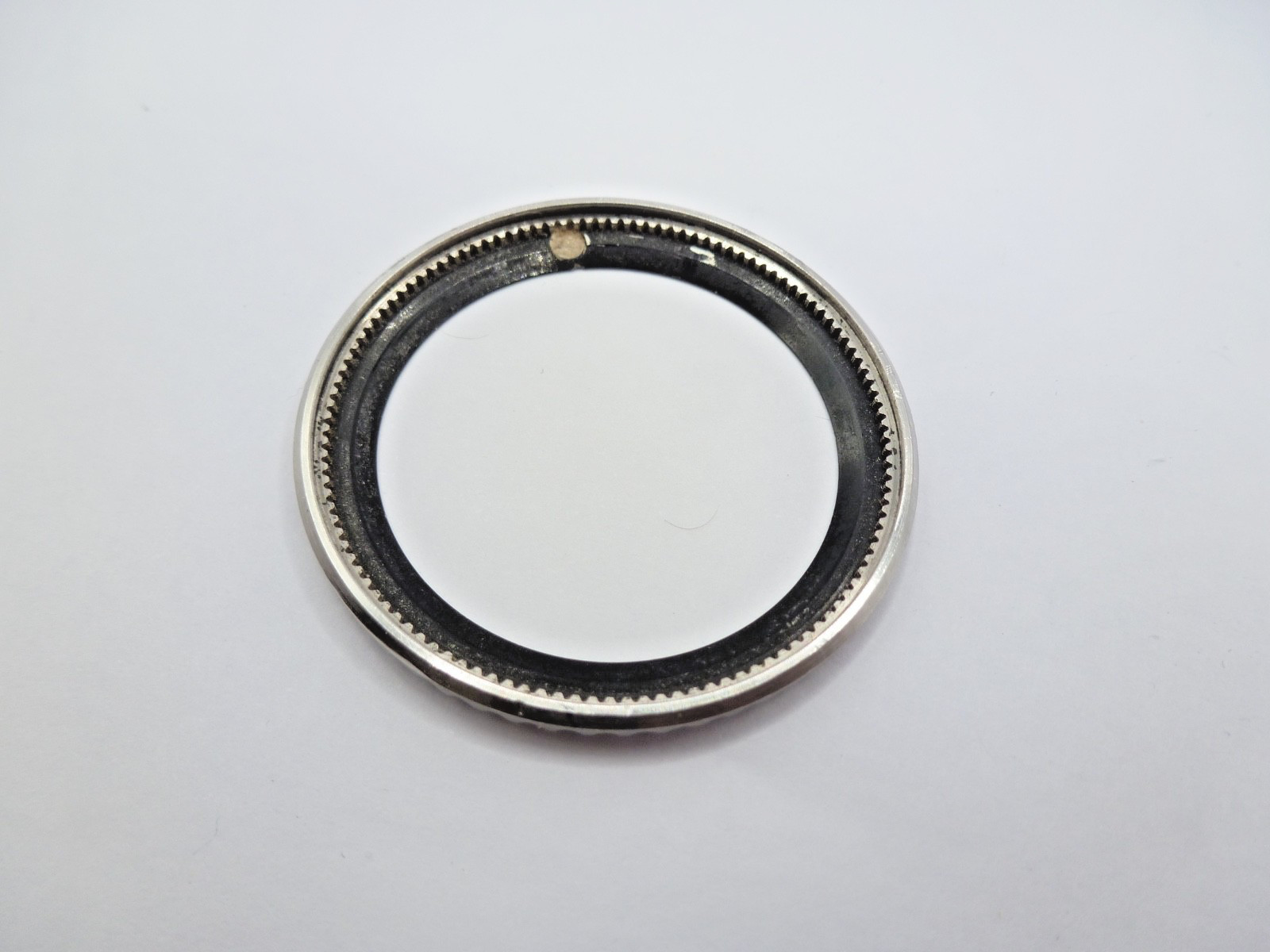 Genuine Rolex Submariner 16610/16800 complete bezel with insert vintage used .