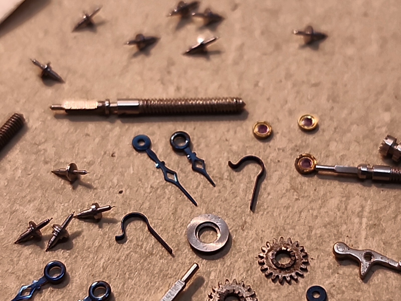 Lot Of NOS Elgin 21/0 Mixed Parts-Stems, Balance Staffs, Jewels, Hands, Etc