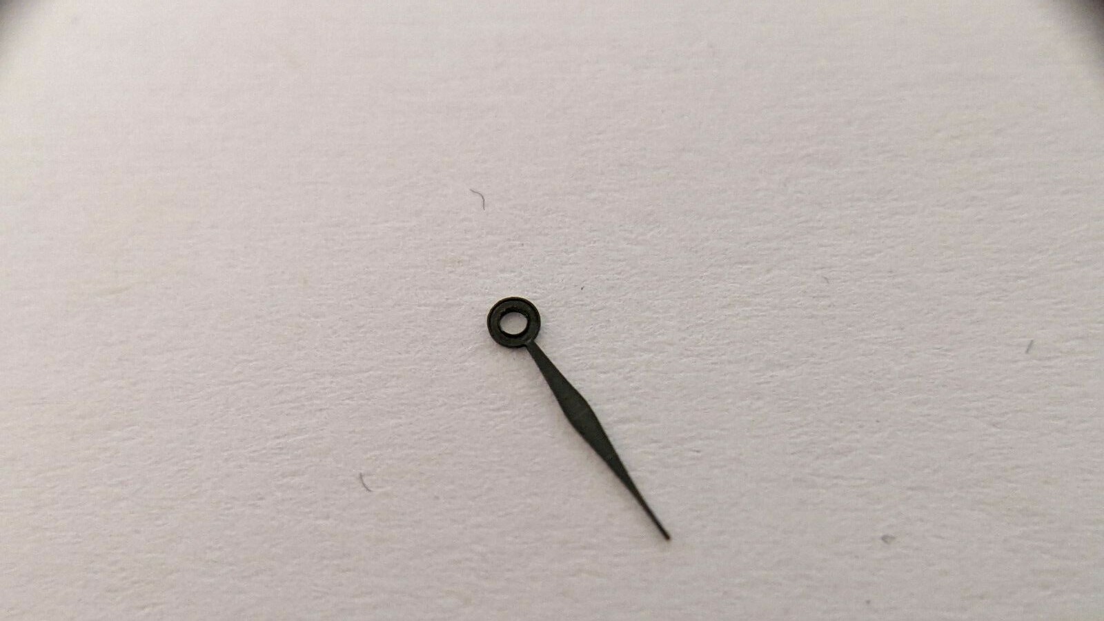Universo MINUTE HAND BLACK. approx 7mm long from center of hole. HOLE: 70. Unive