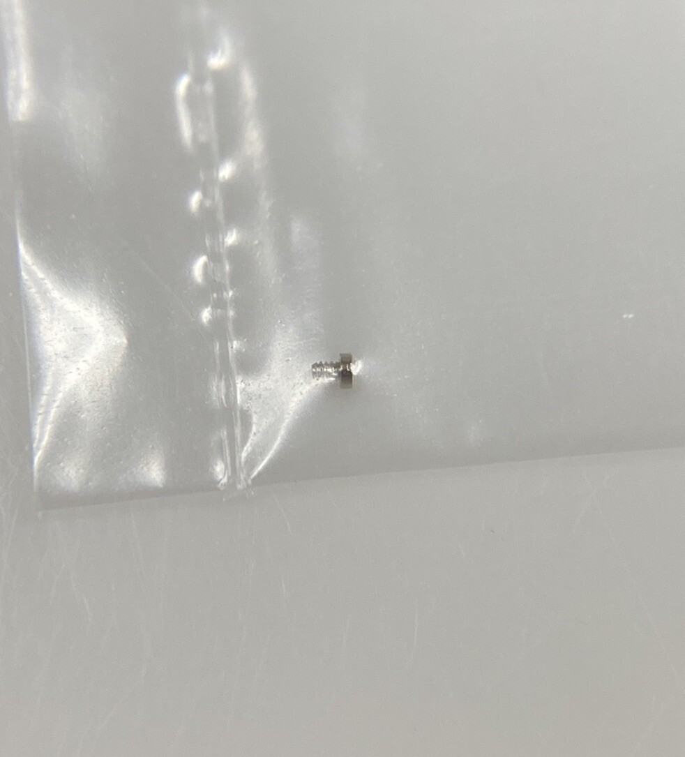 Genuine Rolex 2035 2030-54459 Screw for Plate for Balance Stop Spring (1 PCE)