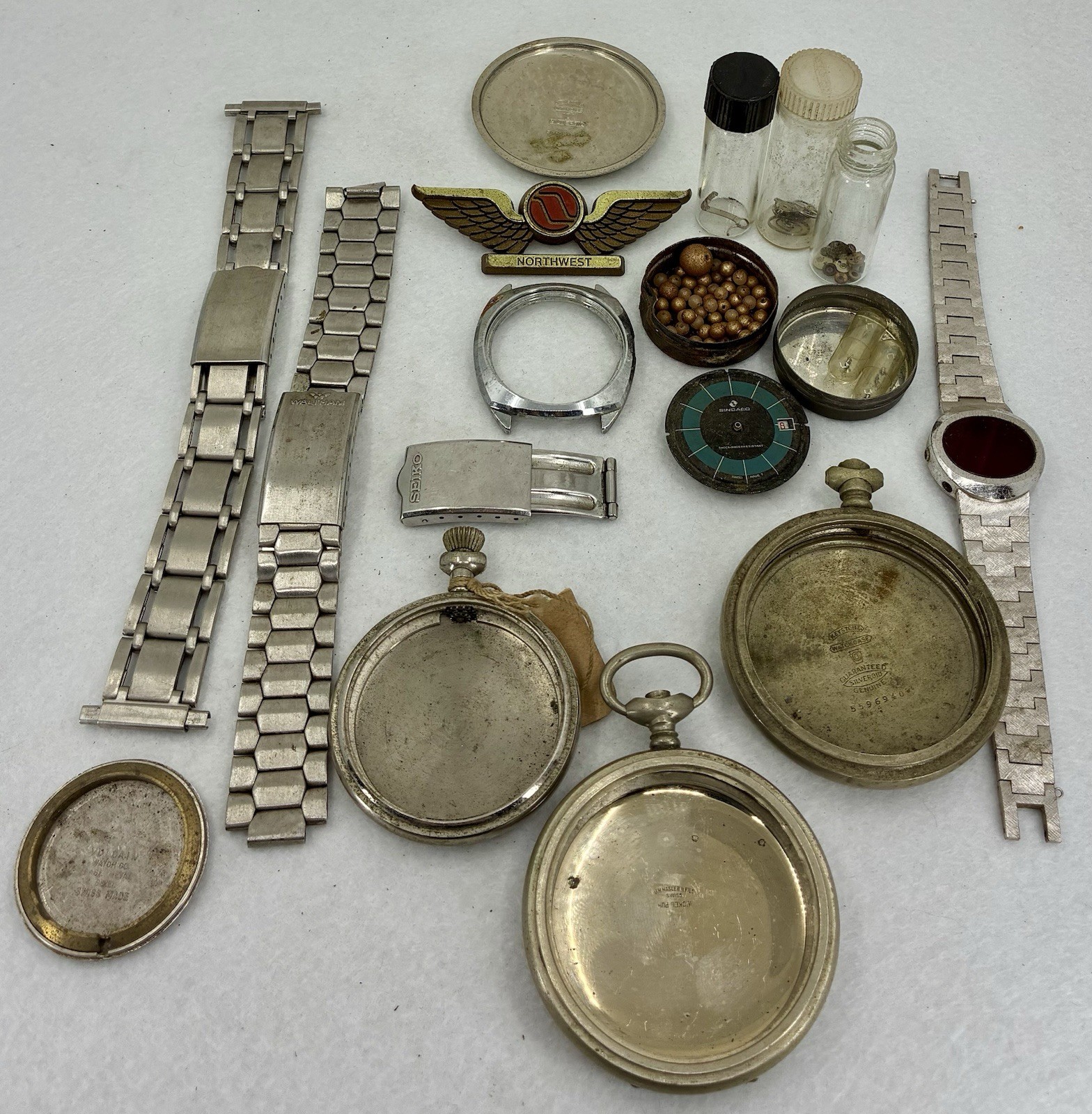 Watchmaker Parts. Lot # 5. Cases, Bracelets, Balances, Mounted Jewels, Etc
