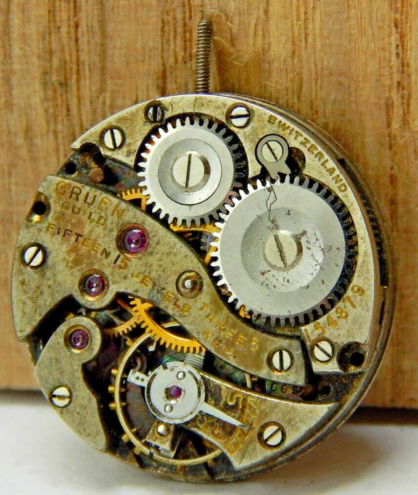 Vintage Gruen 15 Jewel 3 Adjustment 8/0 size watch movement with dial and stem