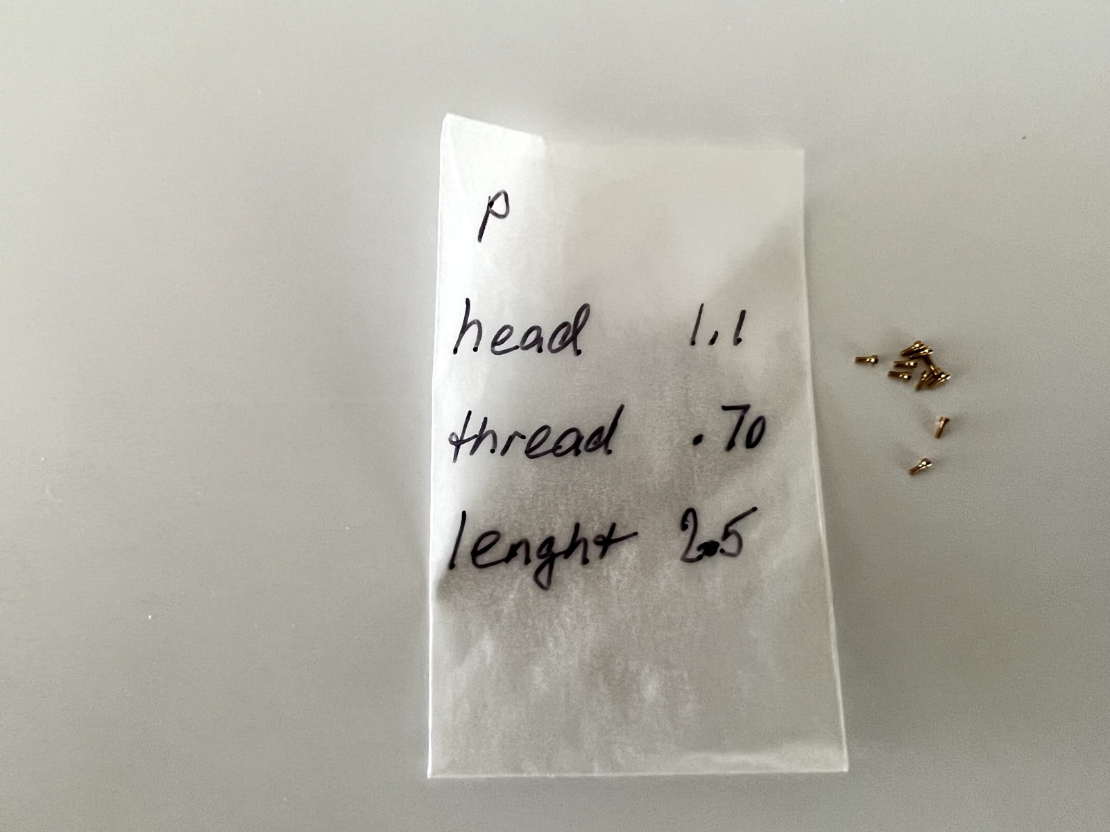 New Piaget 18K gold screw, thread 0.70mm head 1.10mm length 2.50mm One unit. #13