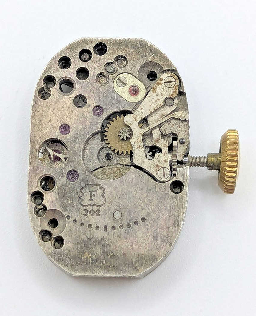 F302 Milus 15 Jewel Manual Watch Movement Swiss Made No Dial Untested 15.1mm