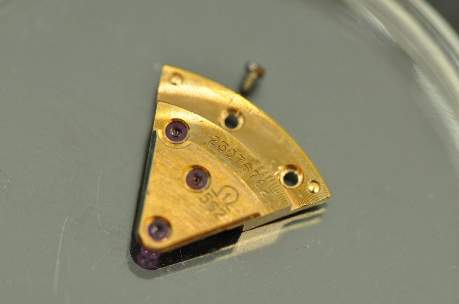Omega watch part 562-1003 train wheel bridge nice used 23xxxxxxx