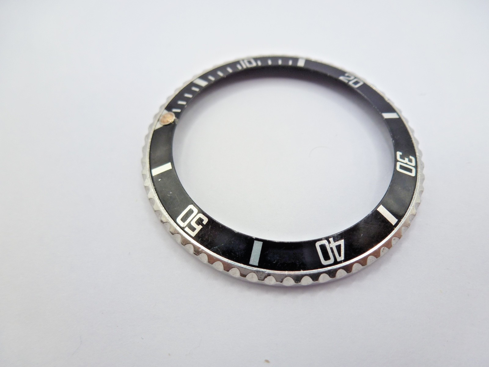 Genuine Rolex Submariner 16610/16800 complete bezel with insert vintage used .