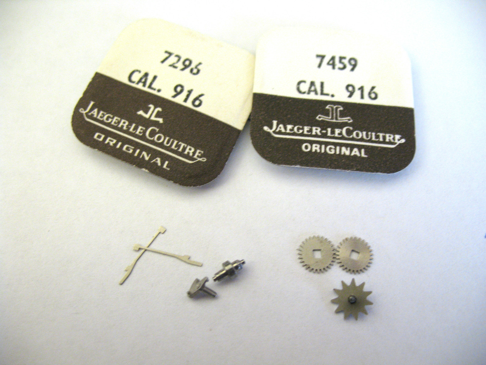 JAEGER LE COULTRE,JLC 916 ASSORTED ALARM NEW OLD STOCK MOVEMENT PARTS