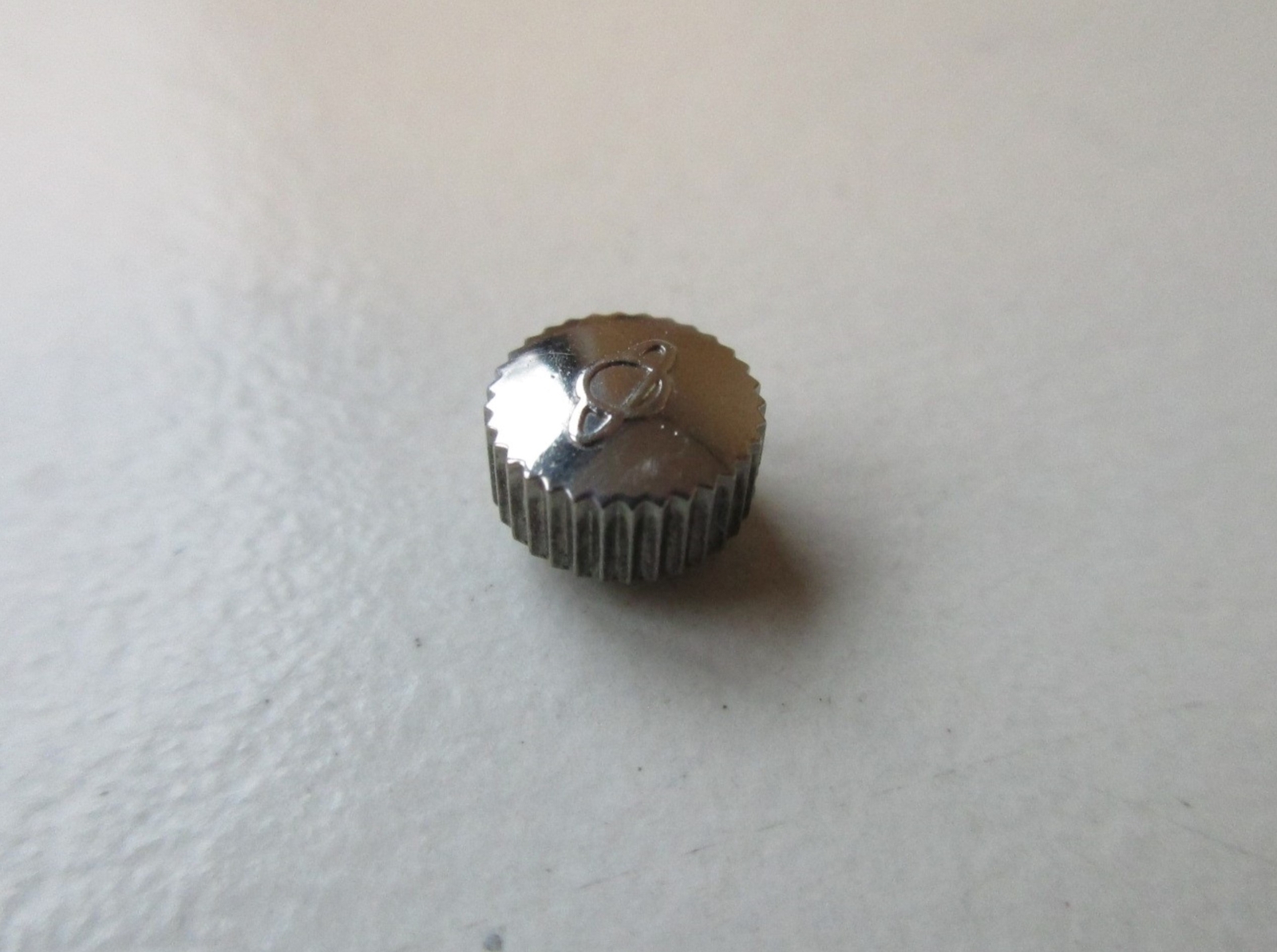 Enicar Swiss S/S watch crown ø 5.5 mm H 3.3 / 3.8 mm, stem thread 0.9 mm NOS