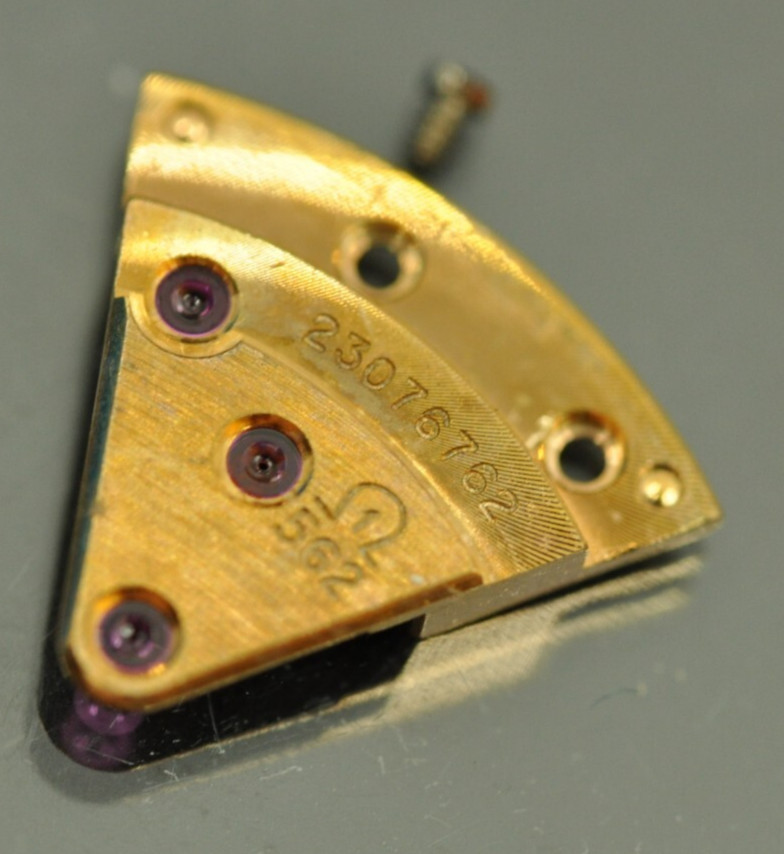 Omega watch part 562-1003 train wheel bridge nice used 23xxxxxxx