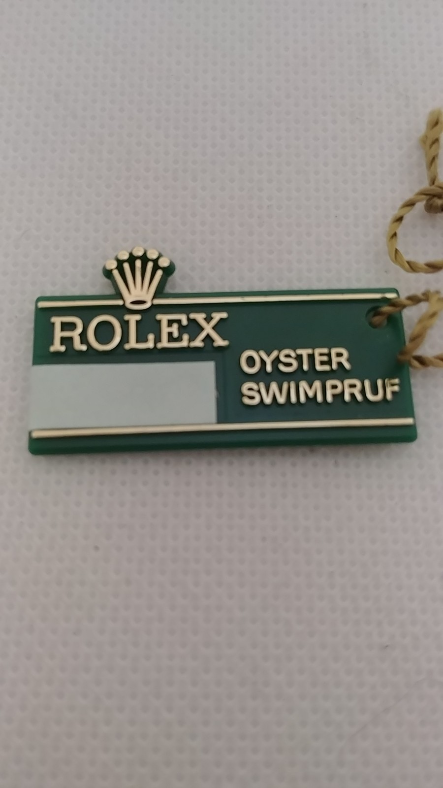 1 Piece Vintage Rolex Oyster Swimpruf Big Crown Green Hang Tag. The item is auth