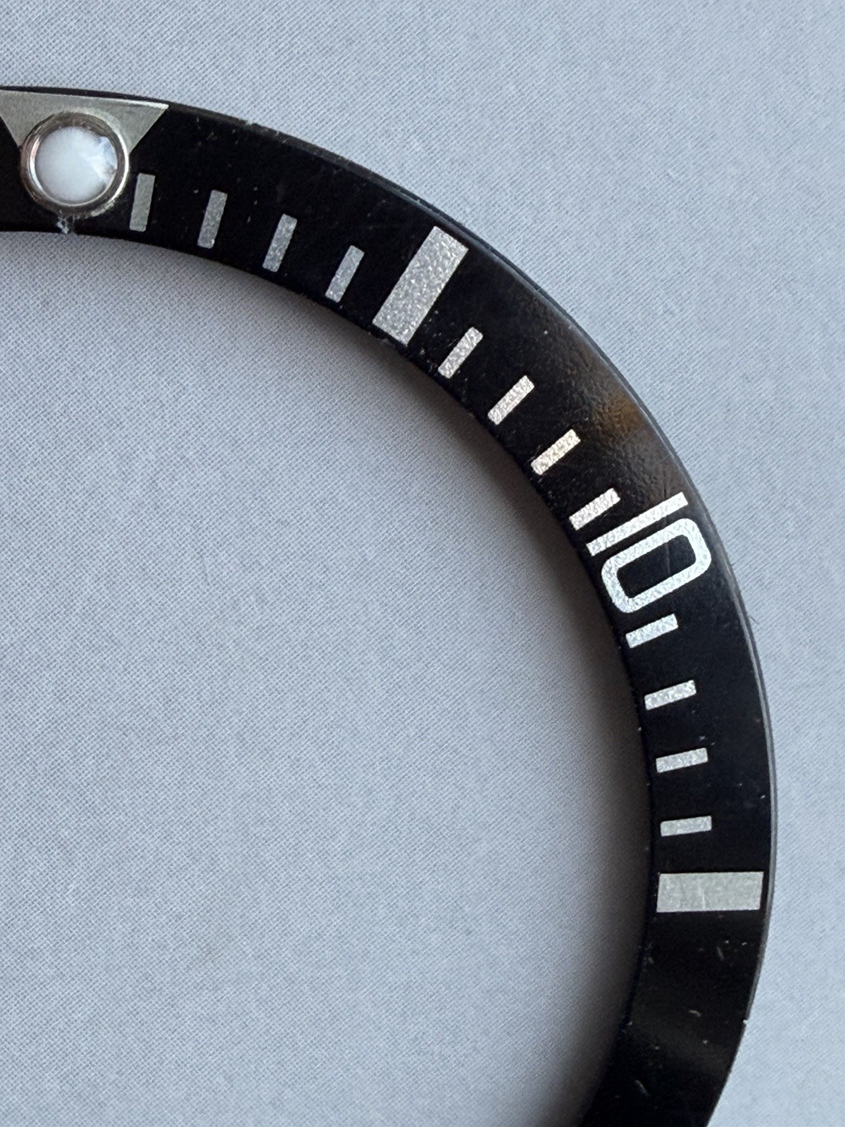 Genuine Rolex 14060/14060M No Date Submariner Bezel Insert , Pre-Owned.