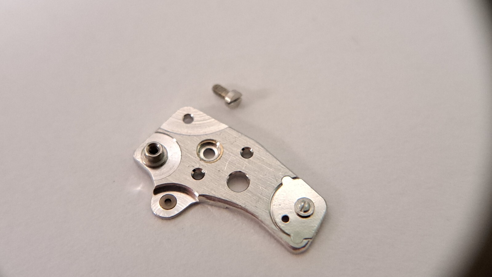 Lecoultre 916 mainplate bridge and screw pre-o for watch repair/parts