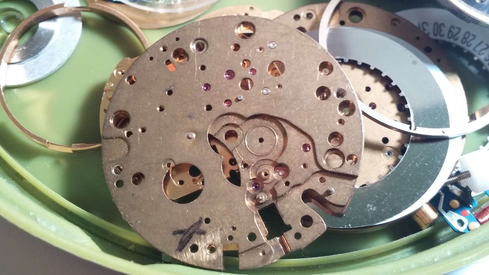 1 LOT of ETA mainplates, parts, calendar date disks, wheels for repair