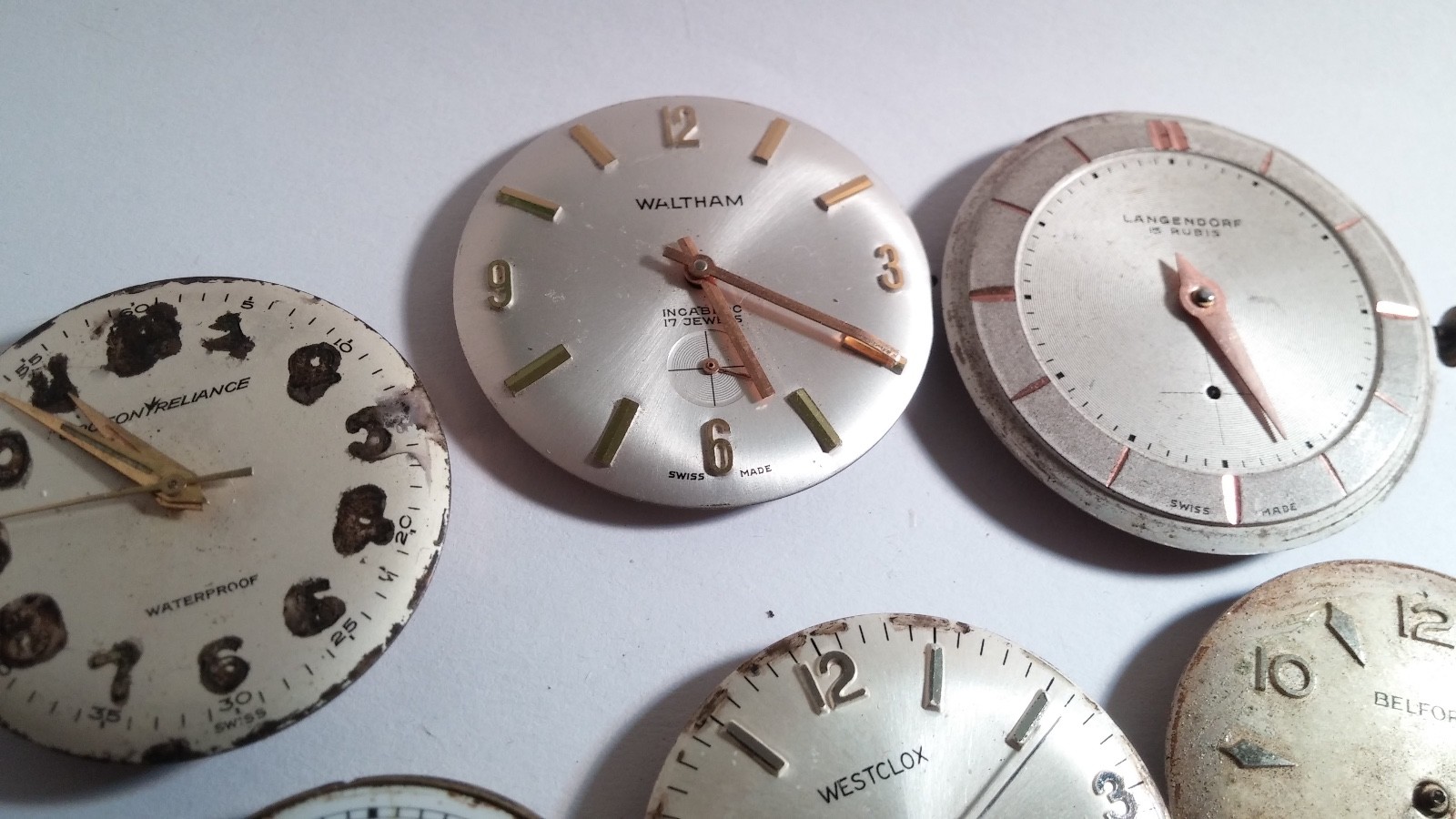 1 LOT of 9 Movements: Waltham France Young’s w/Dial crown, Belforte Q 17 Jewels,