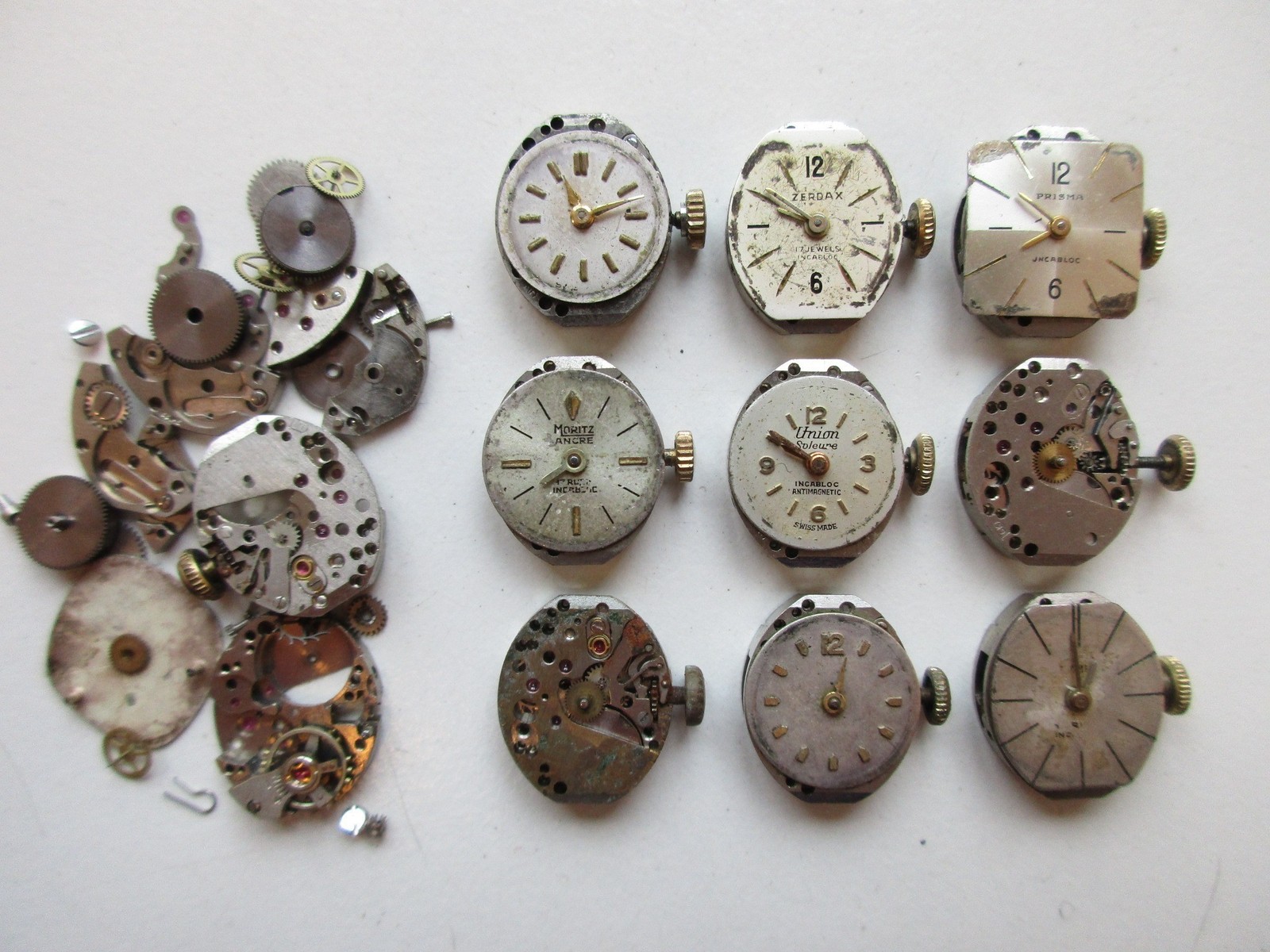 AS A. Schild cal. 1012 Swiss disassembled (10 pcs) watch movements & parts