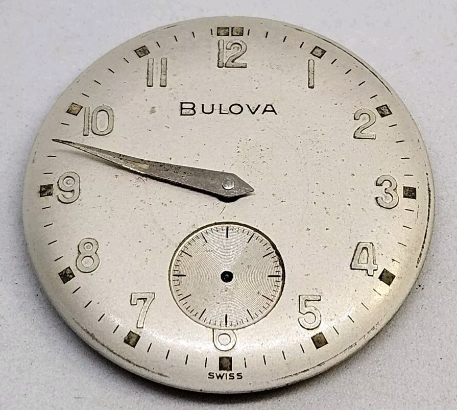 Vintage Bulova 11AC 17 jewel wrist watch movement with silver tone dial
