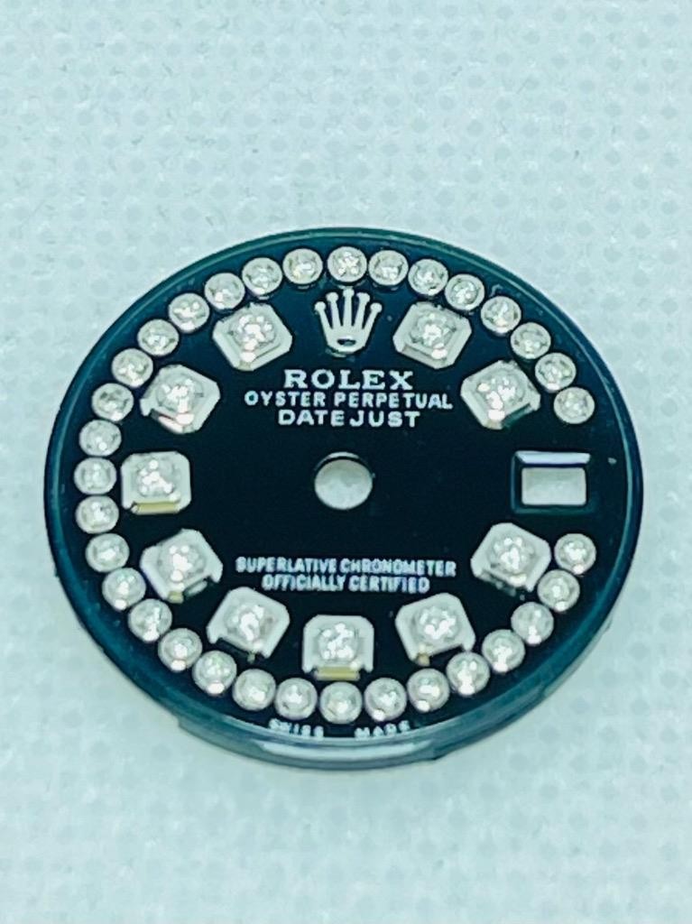 Ladies Rolex Datejust Dial Black 26mm with Diamond Hour Markers.