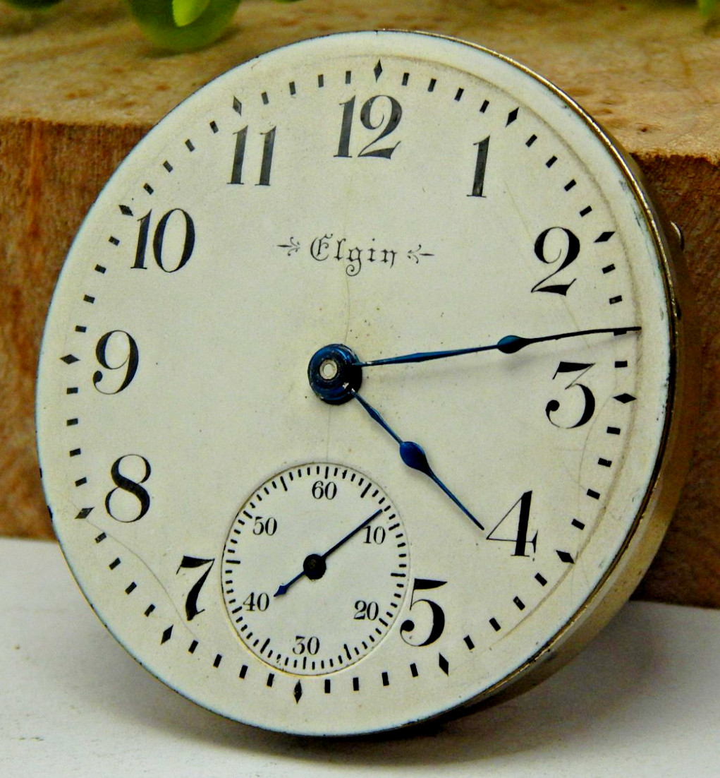 Antique 1902 Elgin 208 7 jewel 18s openface pocket watch movement with hands
