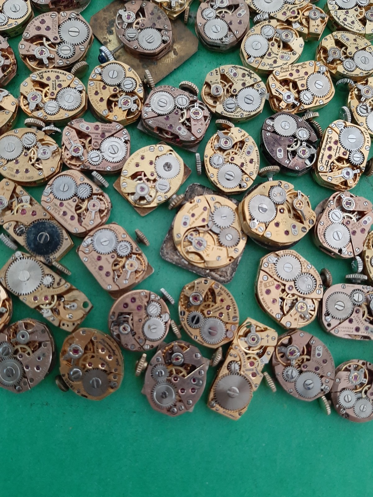 Lot of 60 Mechanical Wrist Watch Movements Parts Repair Manual Gold Cooper Tone