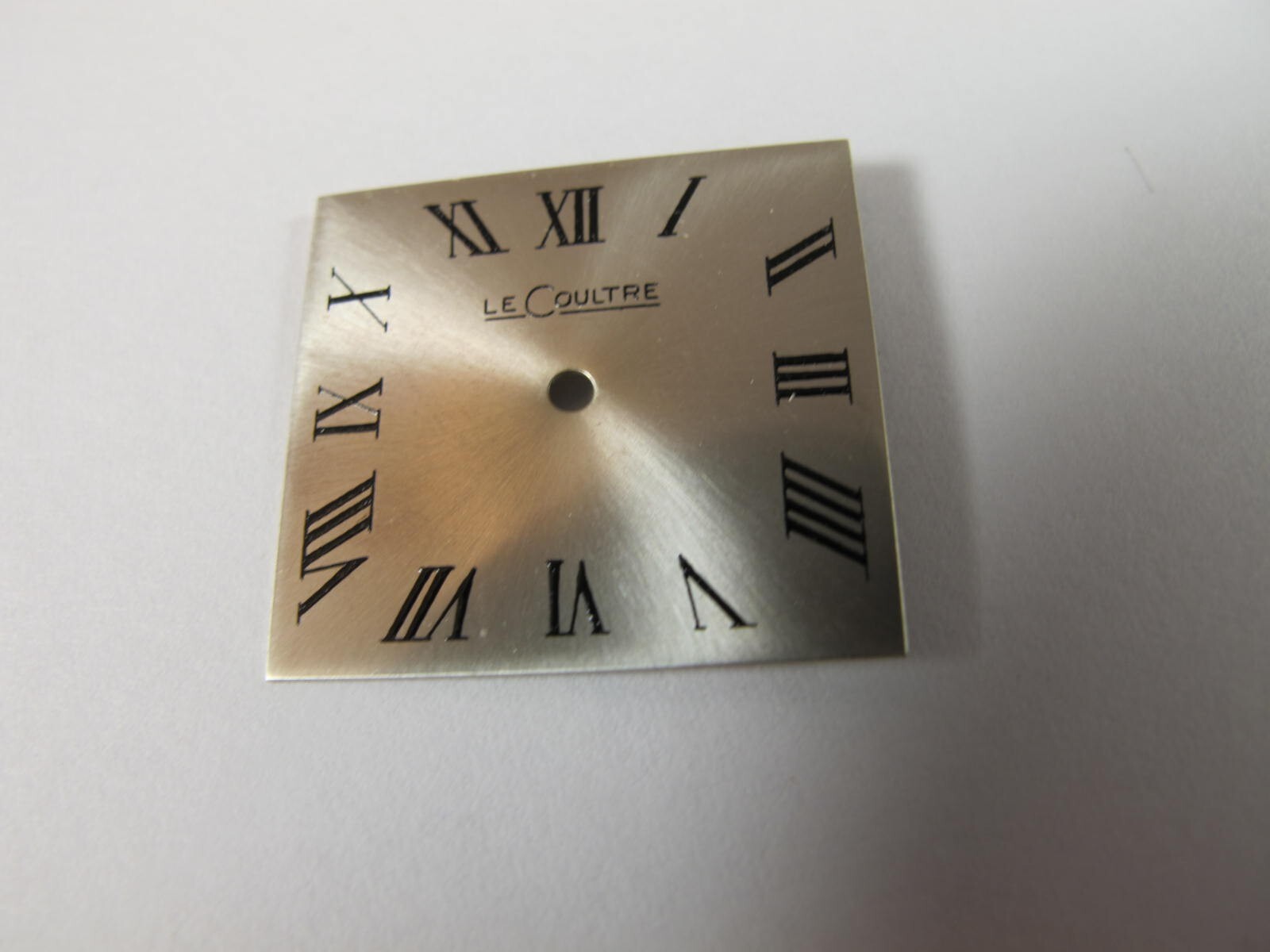 LECOULTRE SILVER COLOR SQUARE DIAL WITH BLACK ROMAN NUMERALS OLD STOCK