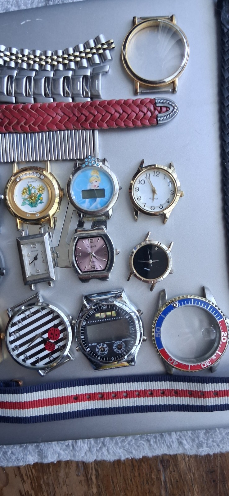 Watch cases and bands, various brands, most just need batteries and bands, parts