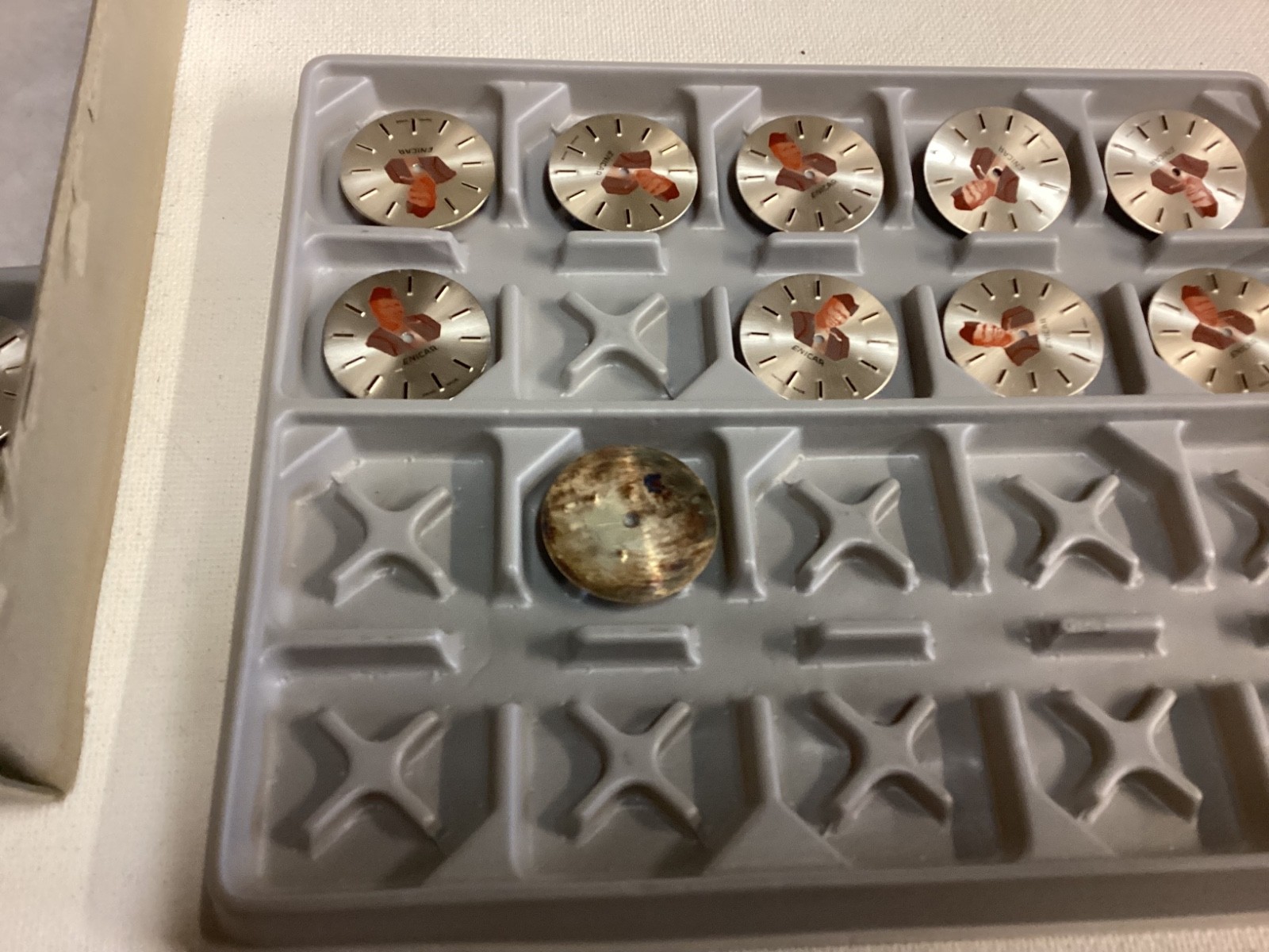 1960’s Box of 90 unused 24mm ENICAR 678_679 watch dials Robert Giavarini Suisse
