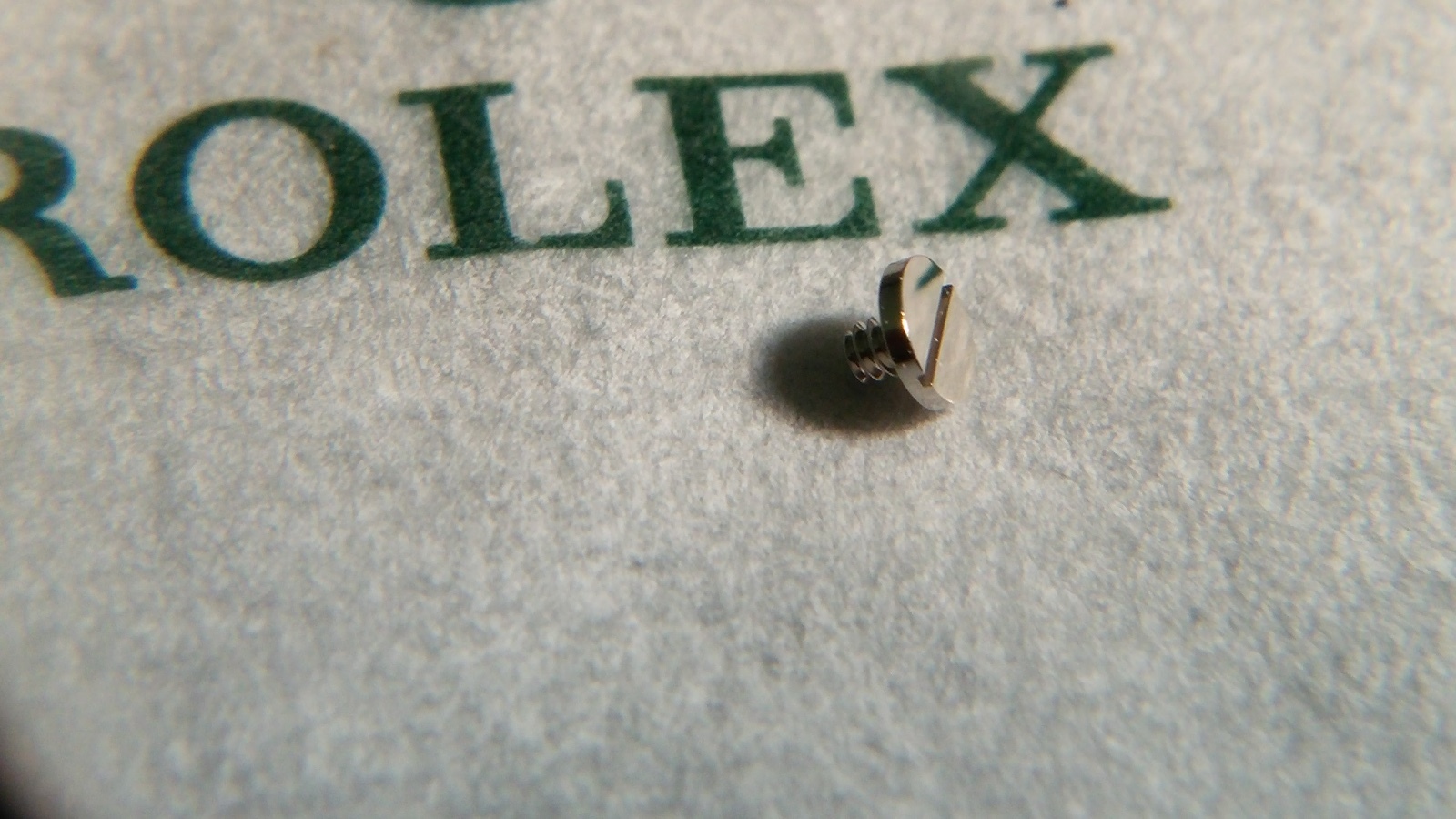 Genuine Rolex 1555 170 Screw. Open package 1 per order