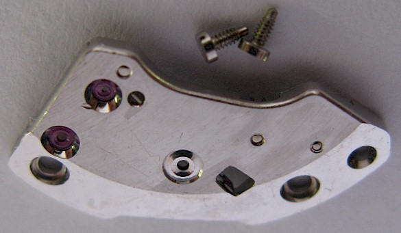 LeCoultre 910 & 911 watch movement part Alarm Barrel Bridge 2 jewels complete