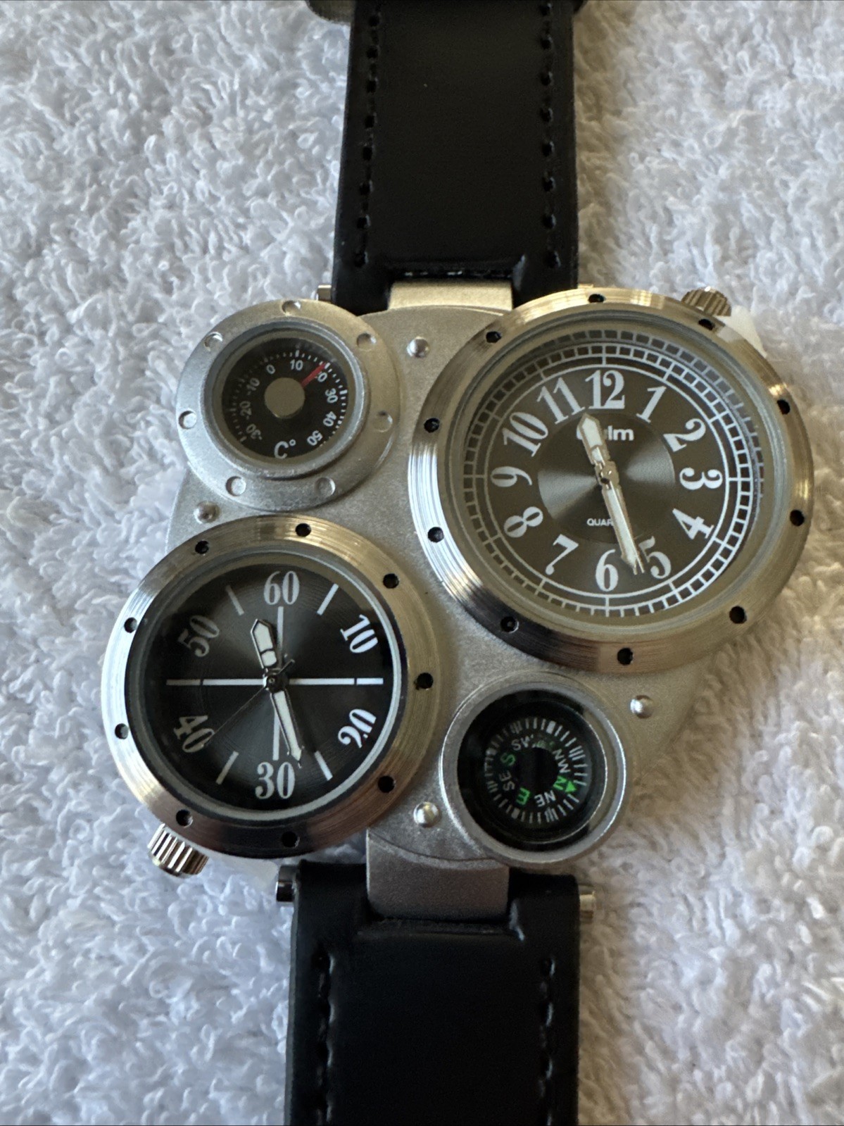 OULM 9415 4 Dial Watch With Two Piece Black Strap Stainless Back